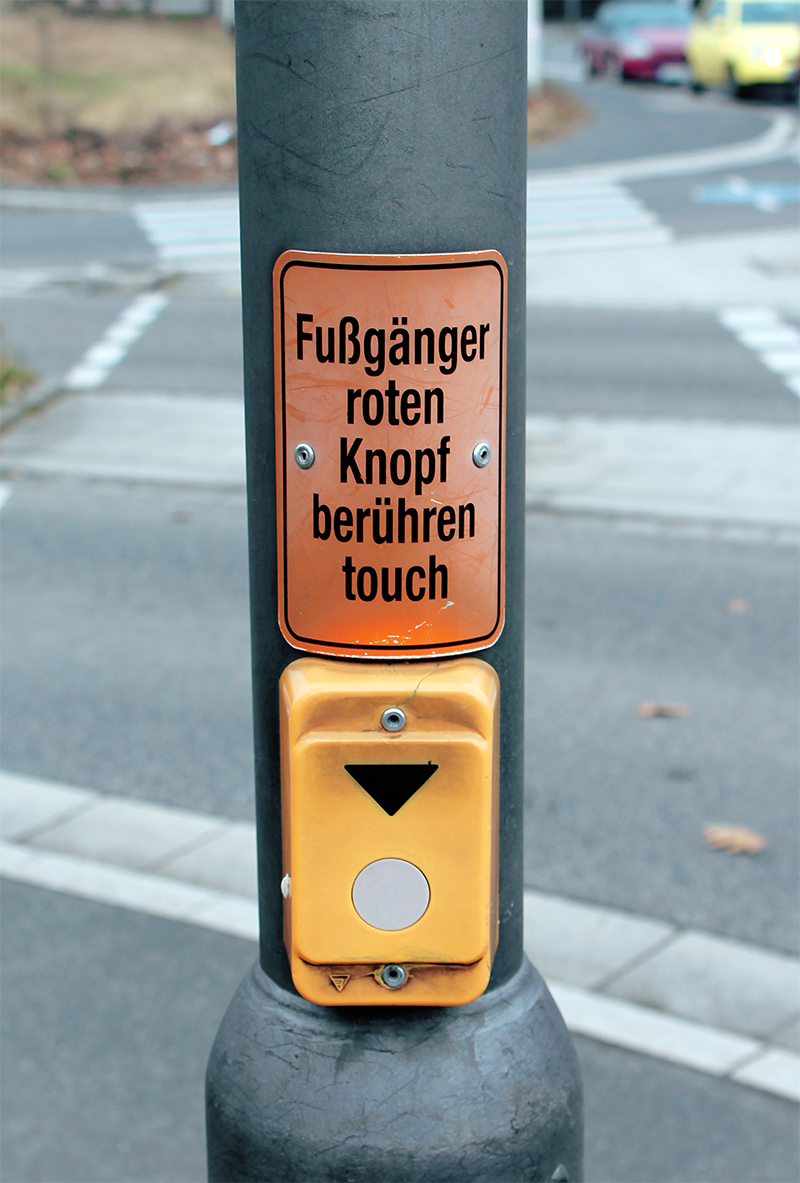 Fußgänger roten Knopf berühren touch
